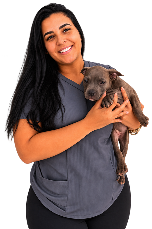 Dra. Larissa com um cão no colo